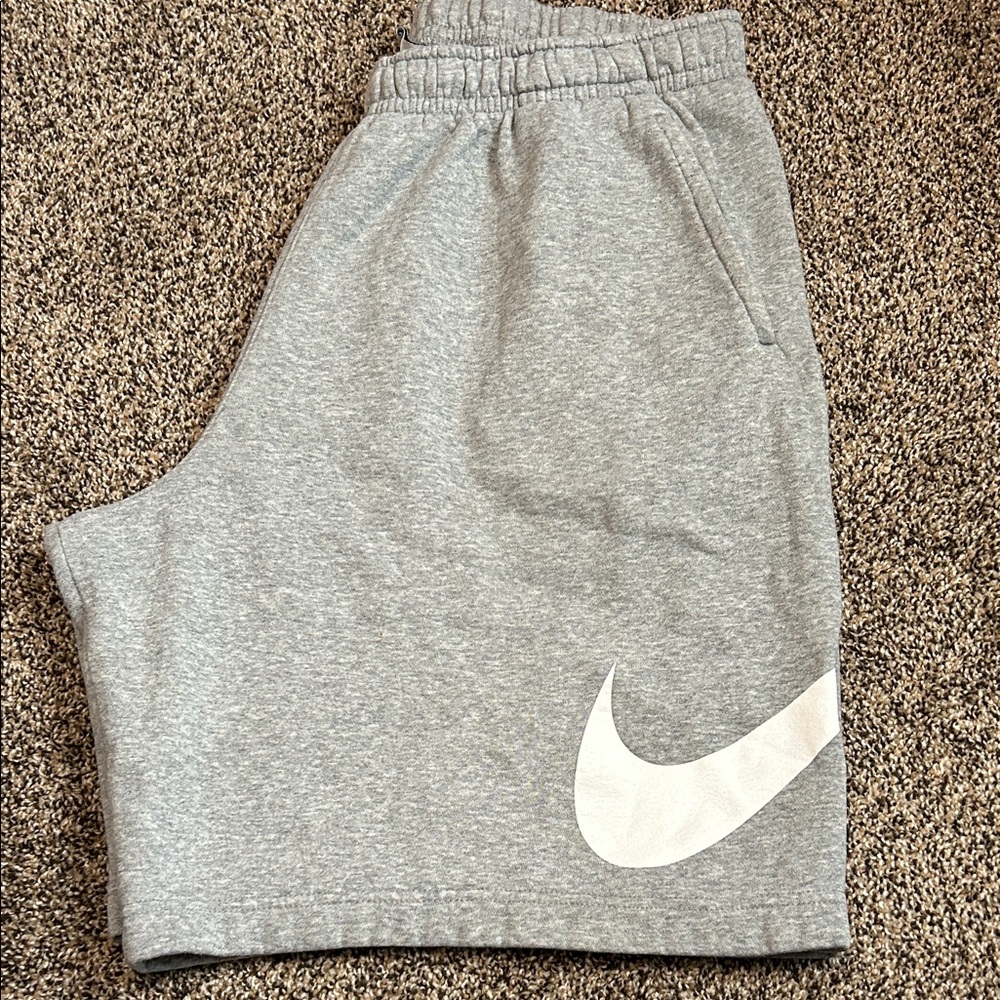 Nike men’s Light Gray Shorts with White Logo